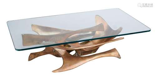 Fred BROUARD 1944-1999
Table basse bronze et verre 
Signée à...