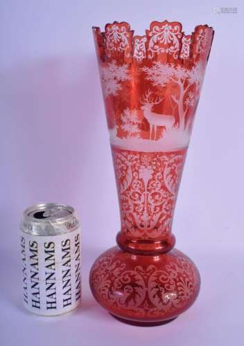 A LARGE 19TH CENTURY BOHEMIAN ENGRAVED CRANBERRY GLASS VASE ...
