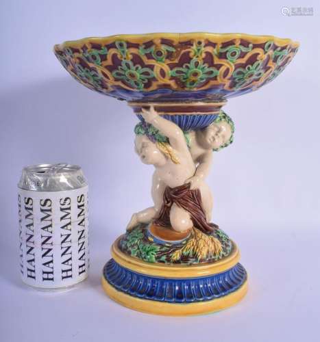 A 19TH MINTON MAJOLICA PEDESTAL DOUPLE PUTTI CENTREPIECE mod...