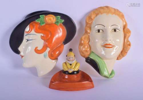 TWO ART DECO PORCELAIN WALL POCKET FACE MASKS together with ...