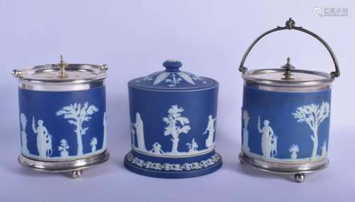 THREE WEDGWOOD JASPERWARE BISCUIT BARRELS. Largest 17 cm x 1...