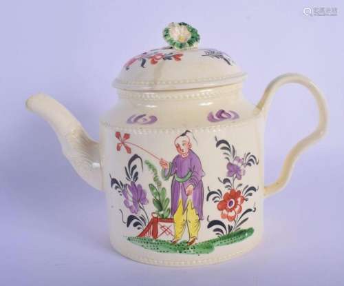 AN 18TH CENTURY ENGLISH CREAMWARE TEAPOT AND COVER painted w...