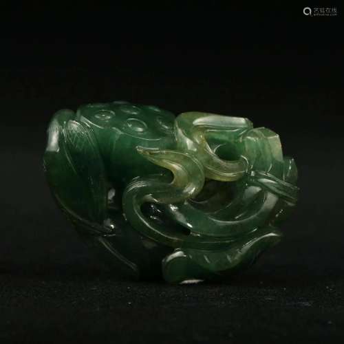 A SPINACH-GREEN 'LOTUS SEEDPOD' JADE BOULDER