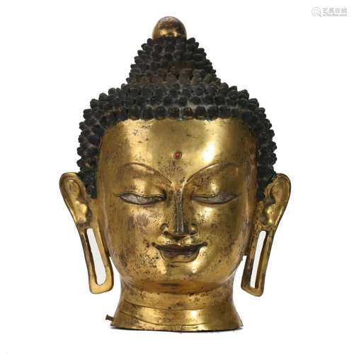 A GILT-BRONZE BUDDHA HEAD