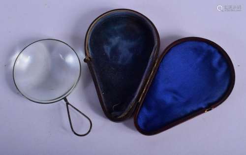 A GEORGE III MAGNIFYING GLASS in a fitted case. 12 cm x 7 cm...