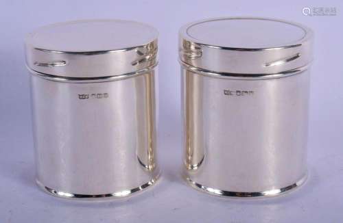 A PAIR OF 1960S SILVER TEA CADDIES AND COVERS by Mappin &...
