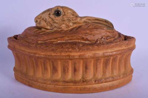 AN ANTIQUE CONTINENTAL POTTERY HARE TUREEN AND COVER. 21 cm ...