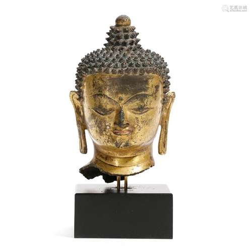 A GILT-BRONZE BUDDHA HEAD