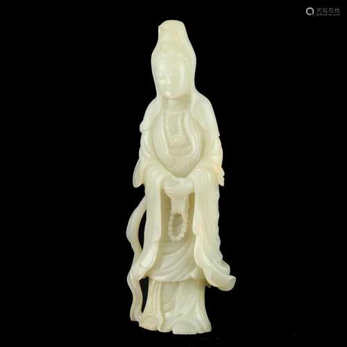 A WHITE JADE FIGURE OF GUANYIN