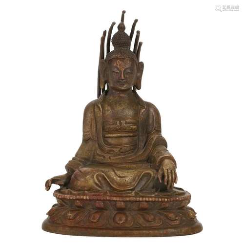 A GILT-BRONZE FIGURE OF SEATED BUDDHA