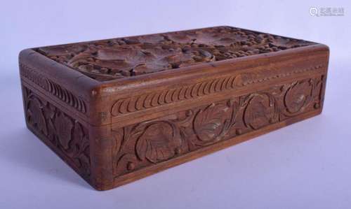 AN EARLY 20TH CENTURY INDIAN CARVED HARDWOOD RECTANGULAR BOX...