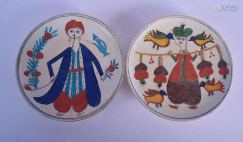 AN UNUSUAL PAIR OF TURKISH FAIENCE KUTAHYA CIRCULAR PLATES p...