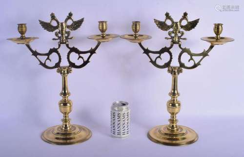 A LARGE PAIR OF ANTIQUE RUSSIAN TWIN HANDLED BRONZE CANDLEST...