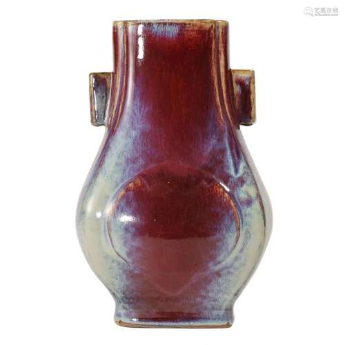 A FLAMBE-GLAZED VASE WITH HANDLES
