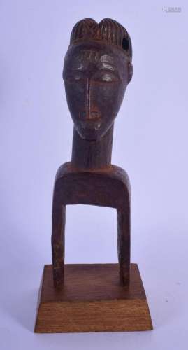 A VINTAGE AFRICAN TRIBAL PULLEY. 20 cm high.