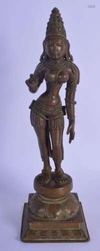 AN 18TH/19TH CENTURY INDIAN BRONZE FIGURE OF A STANDING BUDD...