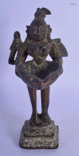 A 17TH/18TH CENTURY INDIAN BRONZE FIGURE OF A STANDING BUDDH...