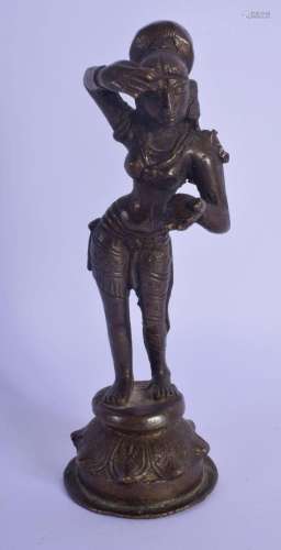 A 19TH CENTURY INDIAN BRONZE FIGURE OF A STANDING BUDDHIST D...