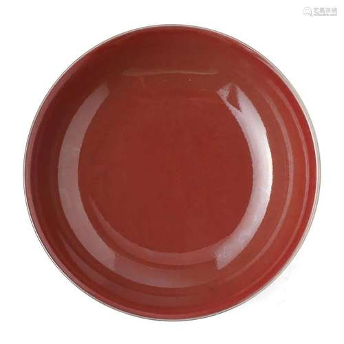 A RED-GLAZED DISH