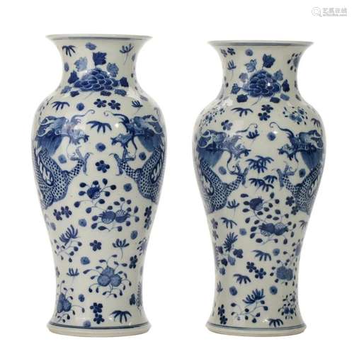 A PAIR OF BLUE AND WHITE 'DRAGONS' VASES