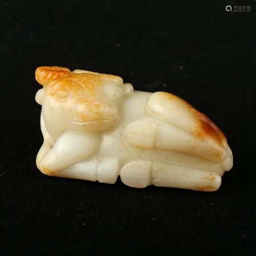 A WHITE AND RUSSET JADE 'BEAST' CARVING