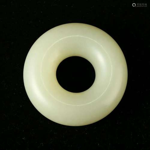 A WHITE JADE LOOP PENDANT