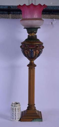 AN UNUSUAL 19TH CENTURY ENGLISH STONEWARE AND BRASS OIL LAMP...