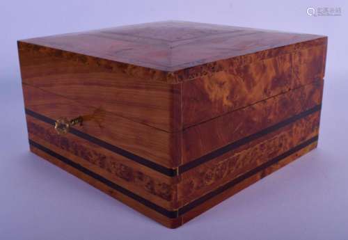 A GOOD QUALITY BURR WALNUT SQUARE FORM BOX with fitted inter...