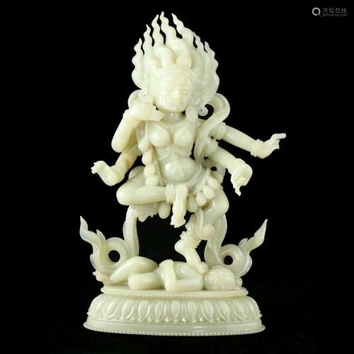 A WHITE JADE BUDDHA FIGURE