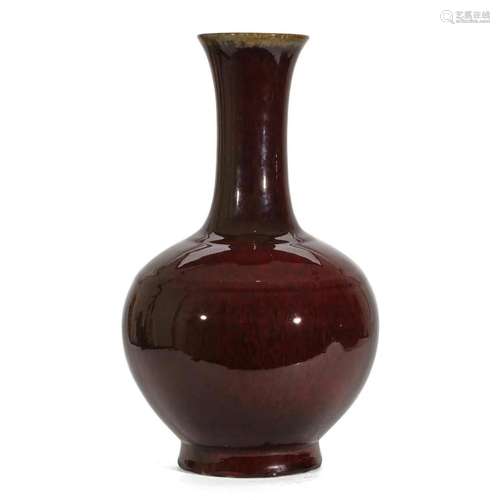 A RED-GLAZED VASE