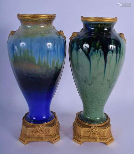 A FINE PAIR OF FRENCH ART NOUVEAU PORCELAIN VASES by Douchet...