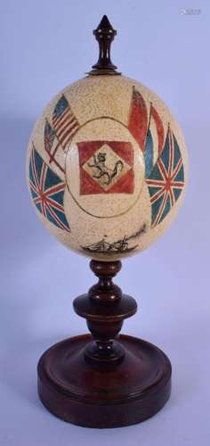 A RARE ANTIQUE AUSTRALIAN PAINTED OSTRICH EGG upon a mahogan...