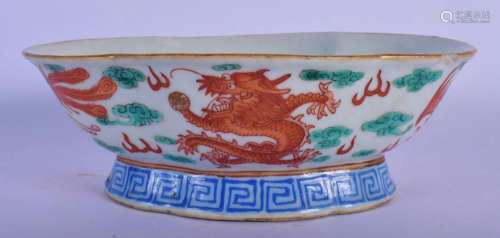 A LATE 19TH CENTURY CHINESE IRON RED GLAZED PORCELAIN OVAL B...