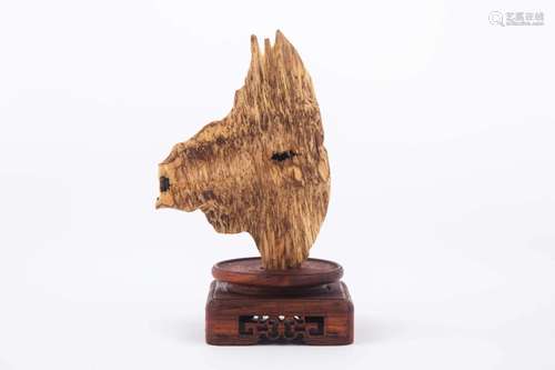 AN AGARWOOD ORNAMENT