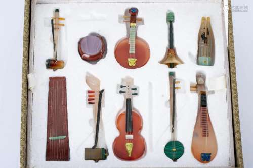 EXPORT A SET OF JADE MUSICAL INSTRUMENTS
