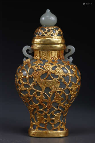 A Hetian Jade Bottle with Gold Surround.