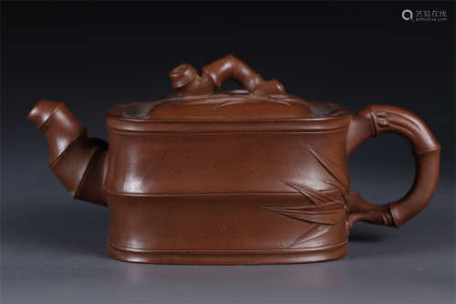 A Bamboo Joint Shaped Purple Clay Teapot.