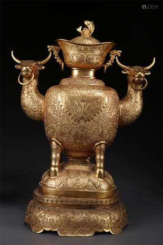 A Gilt Copper Bottle with Beast Face Design.