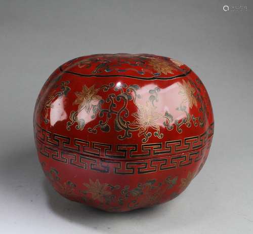 A RED LACQUER CONTAINER