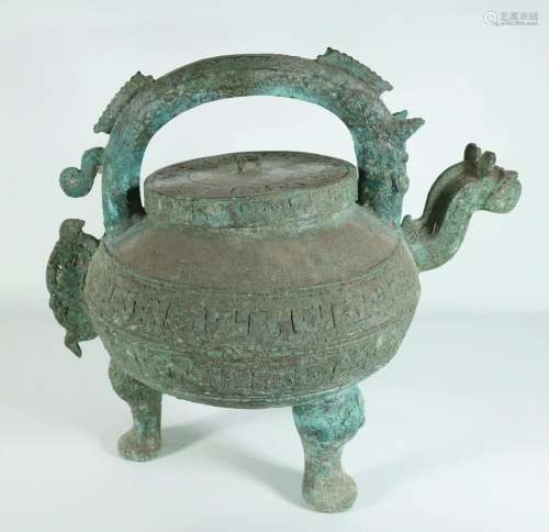 A Rare Bronze "Kui" He (Water Vessel)