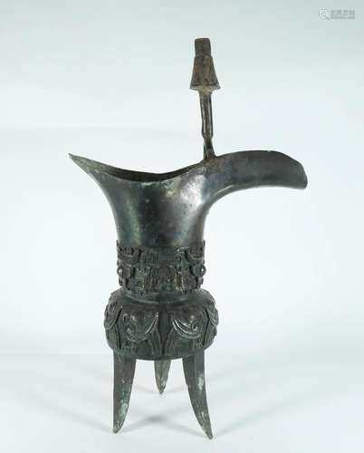 A Fine Bronze "Kui" Three-Legged Jia (Wine Vessel)