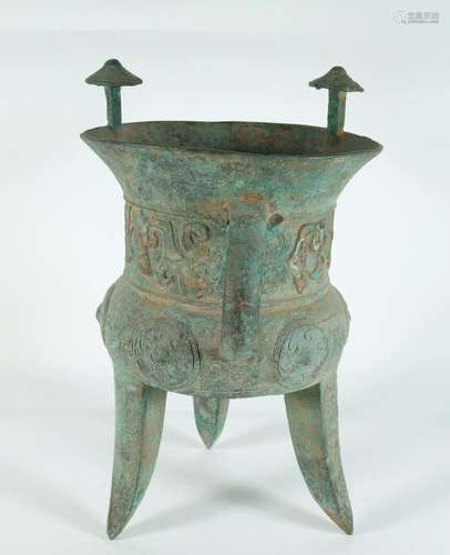 A Bronze "Kui" Three-Legged Jia (Wine Vessel)