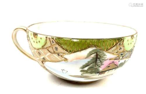 Porcelain Teacup with Moriage Design