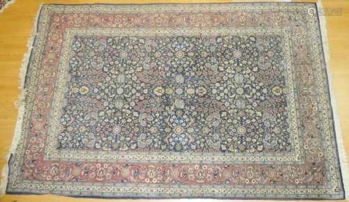 IRAN. Tapis persan à décor de semis de fleurs en laine, 164 ...