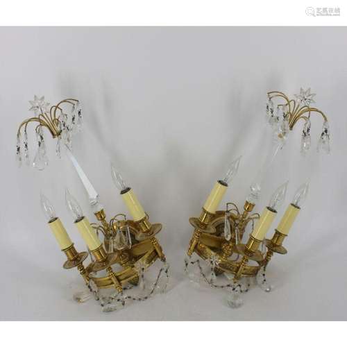 A Pair Of Gilt Bronze And Crystal Sconces .