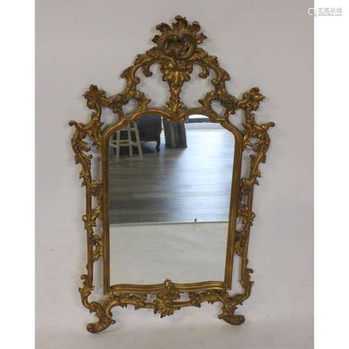 Vintage Rococo Carved And Giltwood Mirror.