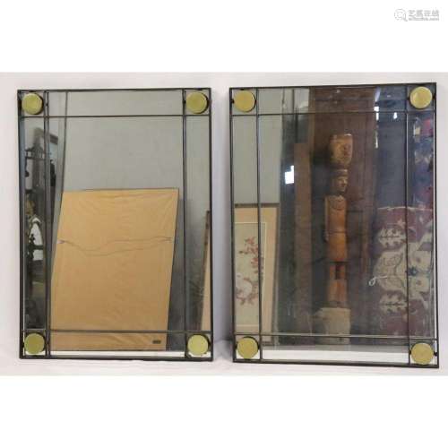 A Vintage Pair Of Metal Mirrors With Brass