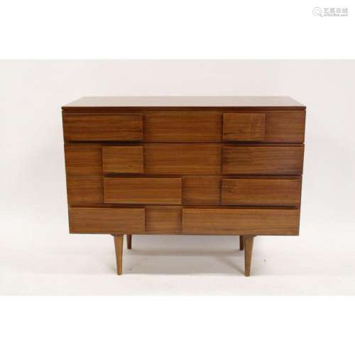 An Unsigned Chest Of Drawers After Gio Ponti.