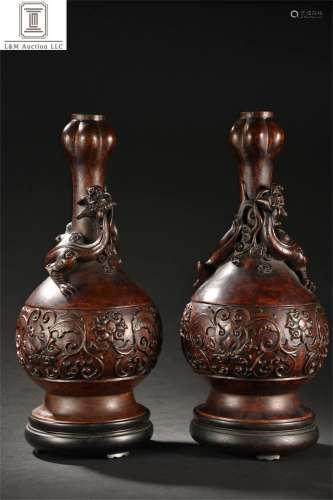 Pair of Carved Agarwood Garlic-Mouth Porcelain Vases