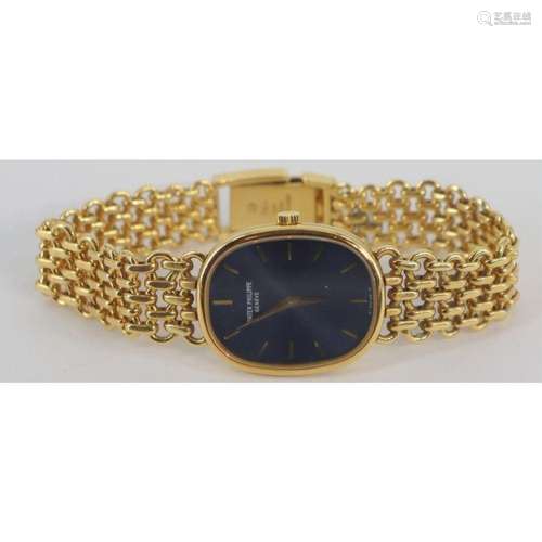 JEWELRY. Lady's Patek Philippe Gold Mini-Ellipse